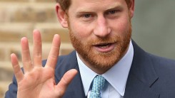 Prince Harry visits Mildmay Hospital in Dec. 14.