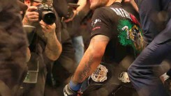 Caption:DALLAS, TX - MARCH 14: Rafael dos Anjos celebrates his win against Anthony Pettis in the Lightweight Title bout during the UFC 185 event at American Airlines Center on March 14, 2015 in Dallas, Texas.