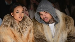 Karrueche Tran (L) and Chris Brown attends the Michael Costello fashion show during Mercedes-Benz Fashion Week Fall 2015 at The Salon at Lincoln Center on February 17, 2015 in New York City.