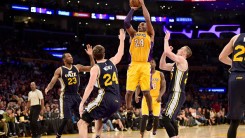 LOS ANGELES, CA - APRIL 13: Kobe Bryant #24 of the Los Angeles Lakers goes up for a shot against Jeff Withey #24 of the Utah Jazz in the fourth quarter at Staples Center on April 13, 2016 in Los Angeles, California.