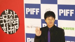 Cha Tae-hyun poses for pictures during the opening ceremony of Pusan International Film Festival on October 6, 2005 in Pusan, South Korea.