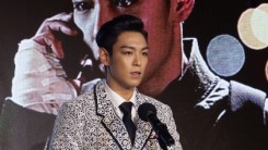 T.O.P of Bigbang award a Rookie prize at Asia Star Awards during the 18th Busan International Film Festival on October 5, 2013 in Busan, South Korea.