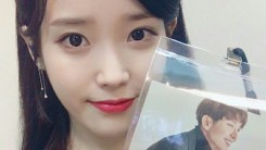 IU showed her pass for Lee Joon-Gi fan meeting in Taiwan on Jan. 8, one day after her concert.