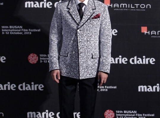 T.O.P of Bigbang arrives for the marie claire Asia Star Awards during the 18th Busan International Film Festival on October 5, 2013 in Busan, South Korea.