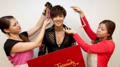 In this handout image provided by Madame Tussauds, Korean entertainer Kim Hyun-joong is measured up on August 15, 2012. Kim Hyun-joong’s wax figure was sculpted after he completed a sitting in 2012 and is wearing clothes personally donated from the star w