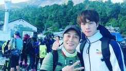 BTS' Jin poses alongside Kim Byung Man for 'Law of the Jungle' in Kota Manado.