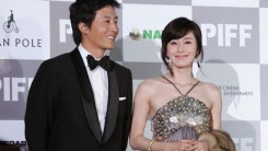 Actor Kim Joo-Hyuk and actress Kim Ji-Soo arrive at the opening ceremony of the 12th Pusan International Film Festival October 4, 2007 in Pusan, South Korea. The festival will showcase a total of 275 films from 64 countries, 193 of the which are world, in