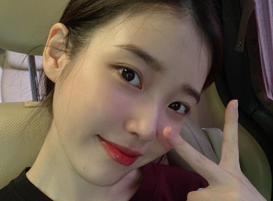 IU flawless skin, cute V