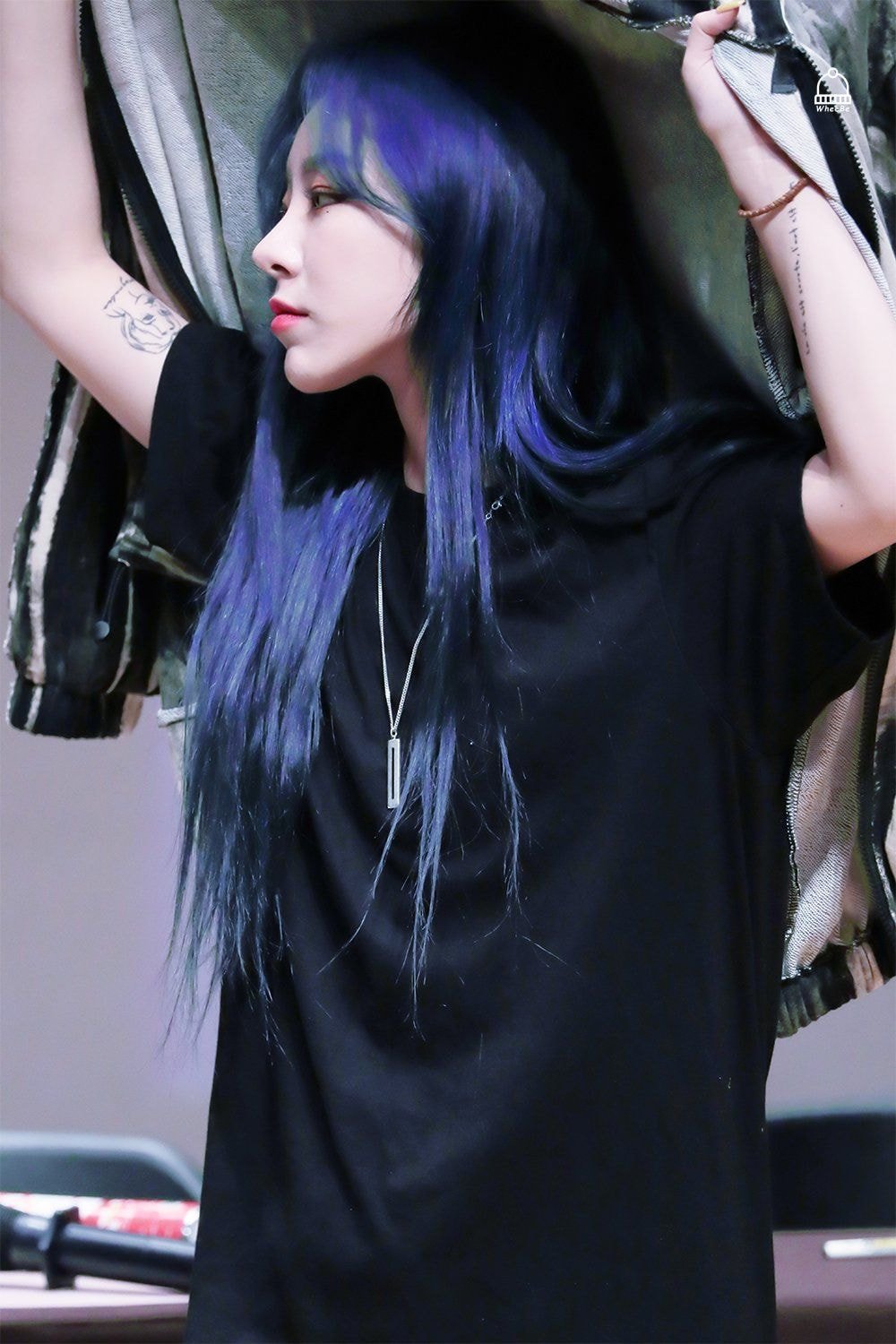 The blue haired girl