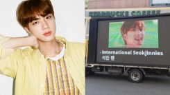 ARMYs Send Truck To Big Hit Entertainment Demanding Fair Treatment For BTS Jin