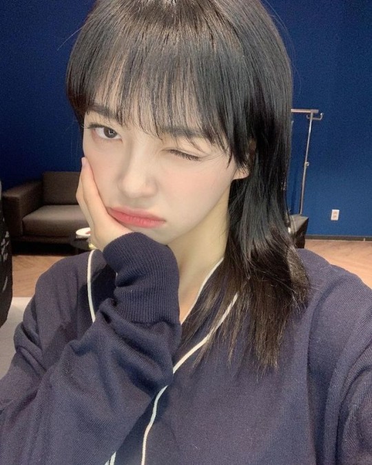 Sejeong, wink with a sulky expression
