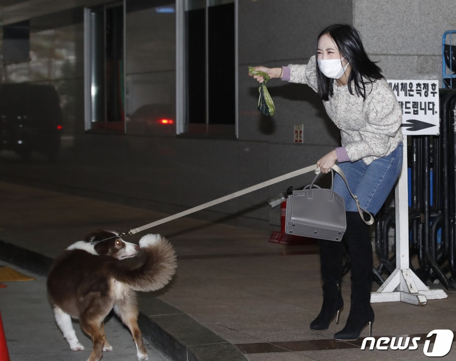 Nicole, with her dog on the way to work