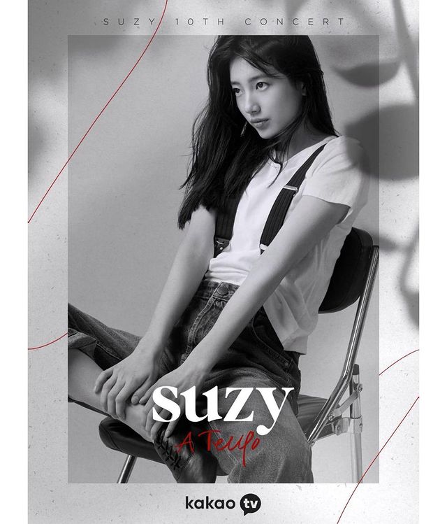 Suzy, practicing guitar for the 10th anniversary performance... Goddess visual