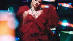 CL reveals concept photo for 'Lover Like Me'... intense blonde + red dress