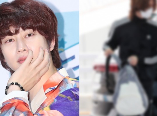 Super Junior Heechul Trends, Sparks Debate for His Airport Bag – Is It a Shark or a Dog?
