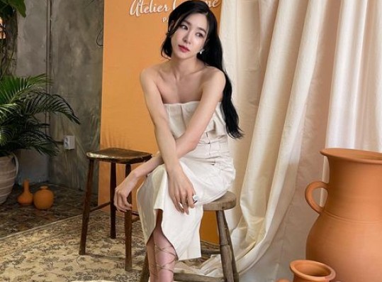 Tiffany Rocks a Sleeveless Dress in Latest Brand Event