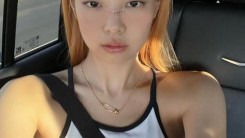 Jennie reveals her collarbone in a luxury top