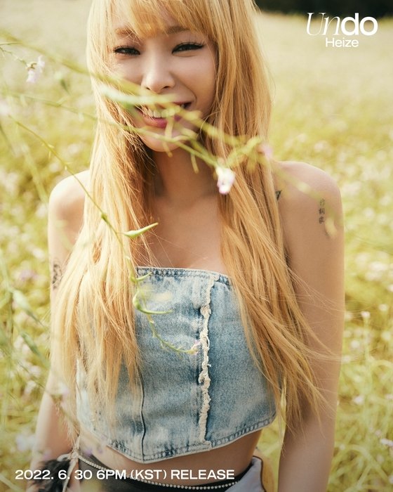 Heize releases 2nd full album photos... Abs on denim top