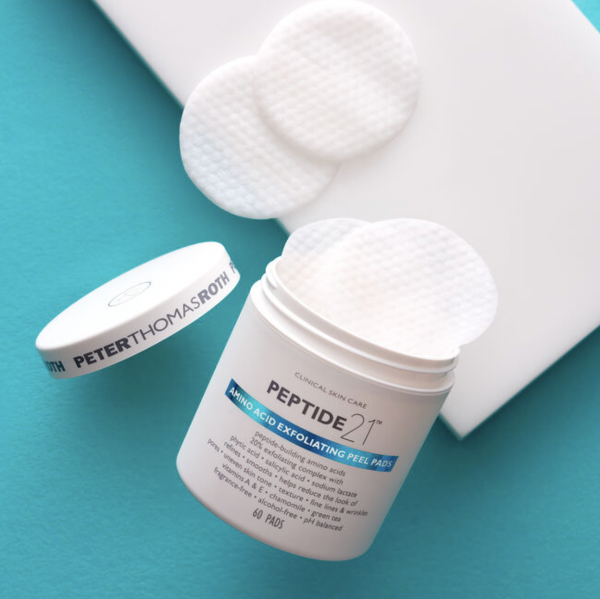 Exfoliating peeling pads with a 21 amino acid peptide