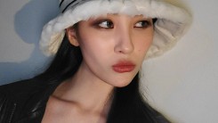 Sunmi, styled with a hat