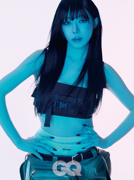 Tiffany, a female warrior force wearing only a top… intense eyes