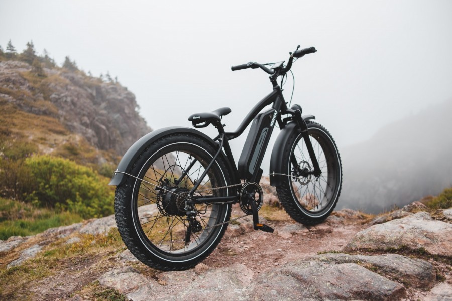Black and gray mountain bike on ground during daytime