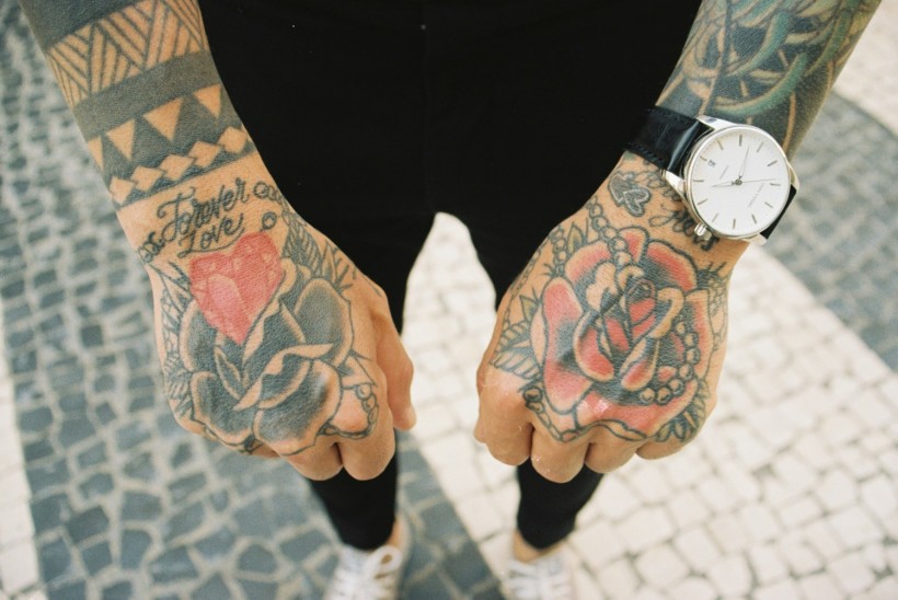flower tattoo on hand