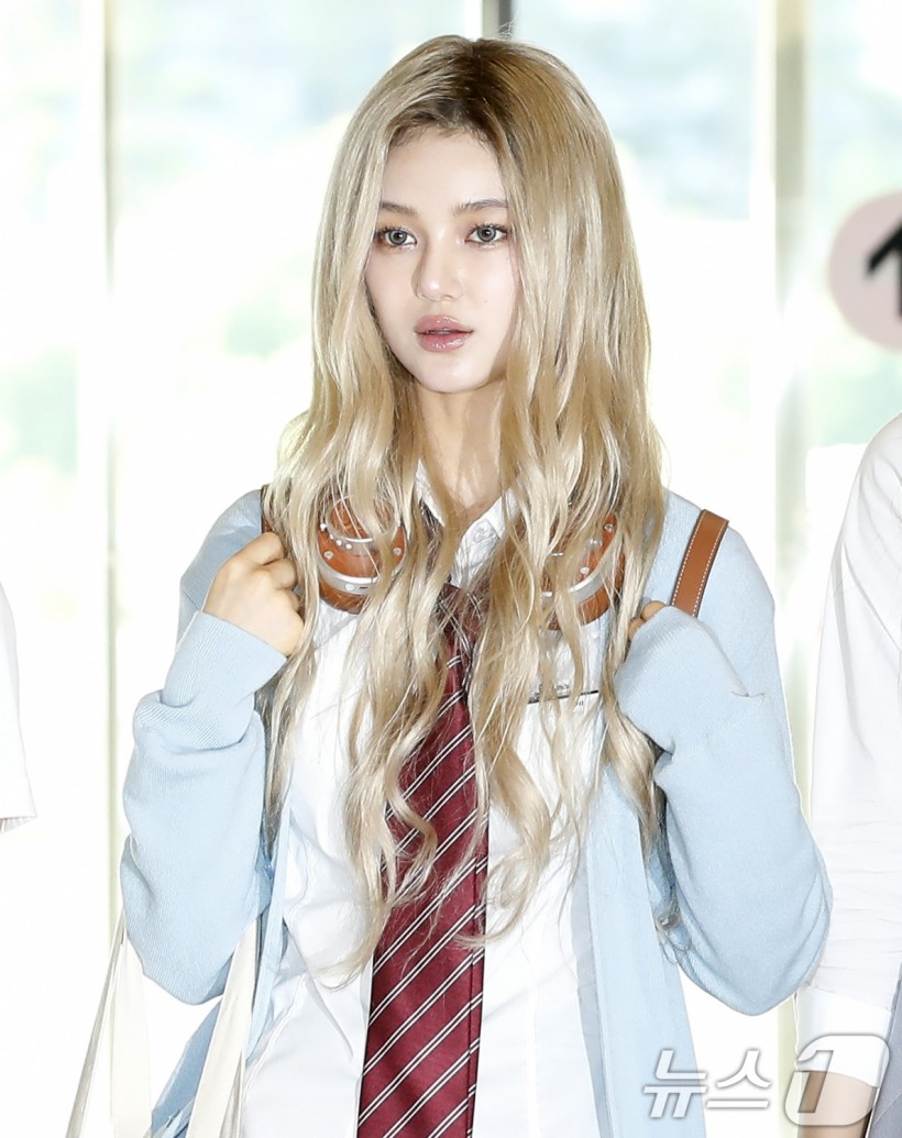 NewJeans School Uniform Airport Fashion Draws Mixed Reaction: Is It Inappropriate?